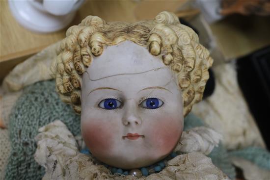 A German bisque-headed doll, no. 966 and two other dolls,